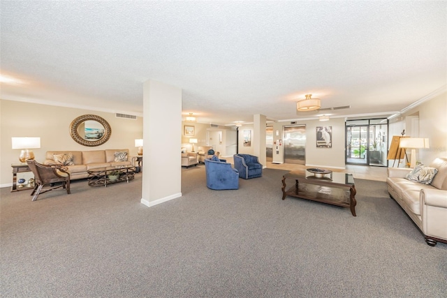 living room featuring ornamental molding, a textured ceiling, and carpet