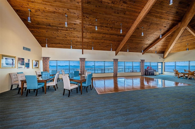 dining space featuring wood ceiling, dark hardwood / wood-style floors, beamed ceiling, and high vaulted ceiling