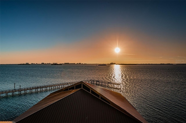 view of dock with a water view