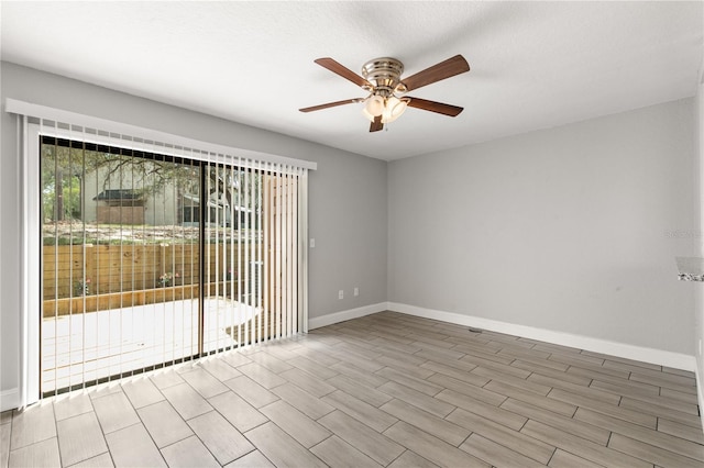 unfurnished room with ceiling fan