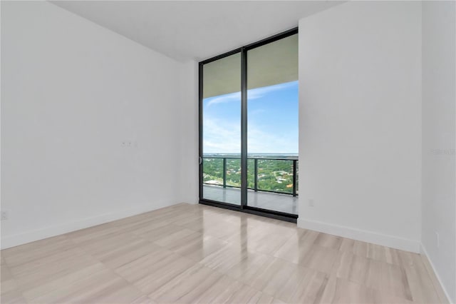 empty room with floor to ceiling windows