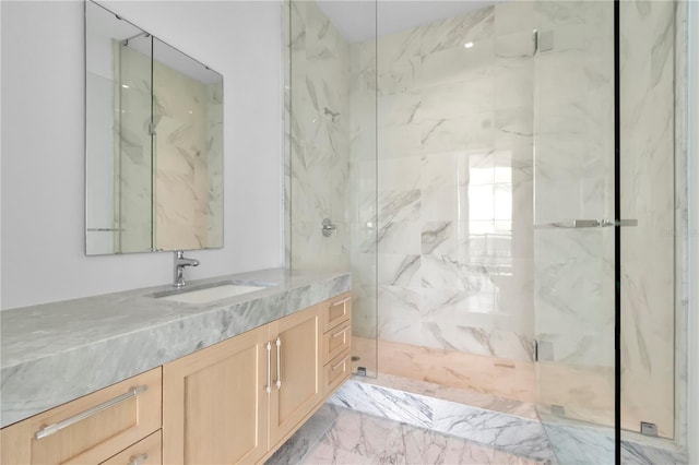 bathroom with vanity and an enclosed shower