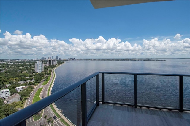 balcony featuring a water view