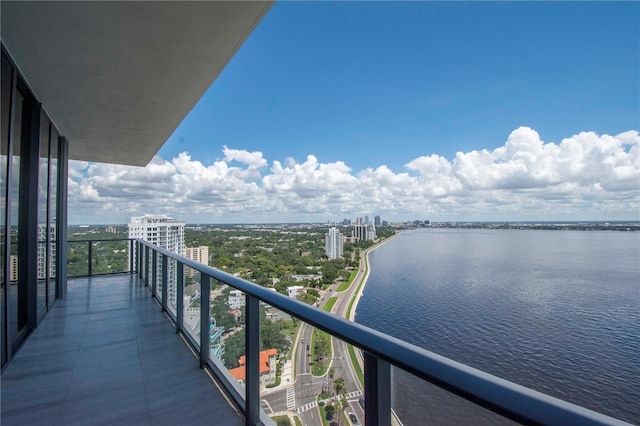 balcony featuring a water view