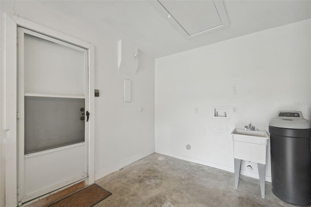 251 Hidden Brook Dr Unit 102C, Palm Harbor, FL 34683 - clothes washing area with baseboards and laundry area