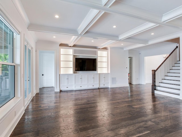 unfurnished living room featuring coffered ceiling, ornamental molding, beam ceiling, and dark wood-type flooring