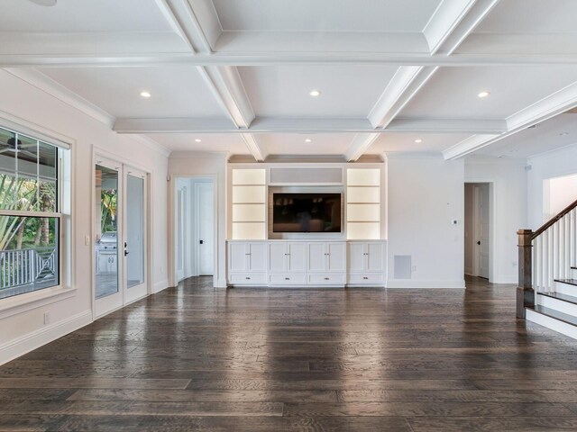 unfurnished living room featuring beam ceiling, coffered ceiling, ornamental molding, and dark hardwood / wood-style floors