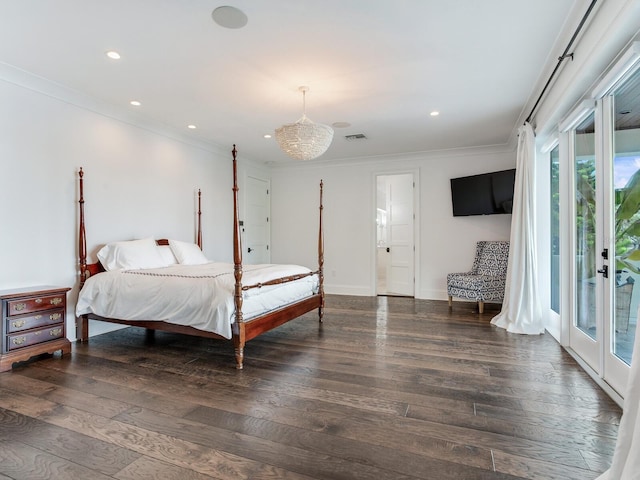 bedroom featuring multiple windows, access to outside, ornamental molding, and dark wood-type flooring