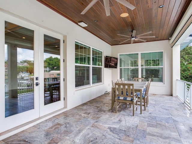 view of patio with ceiling fan and french doors