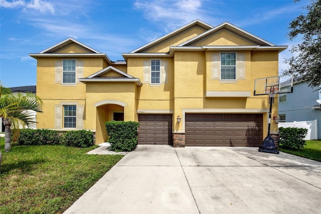 10820 Carloway Hills Dr, Wimauma, FL 33598 - view of front of house with stucco siding, a front lawn, and driveway