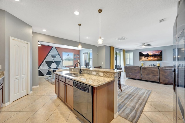 kitchen with a healthy amount of sunlight, decorative light fixtures, sink, ceiling fan, and stainless steel dishwasher