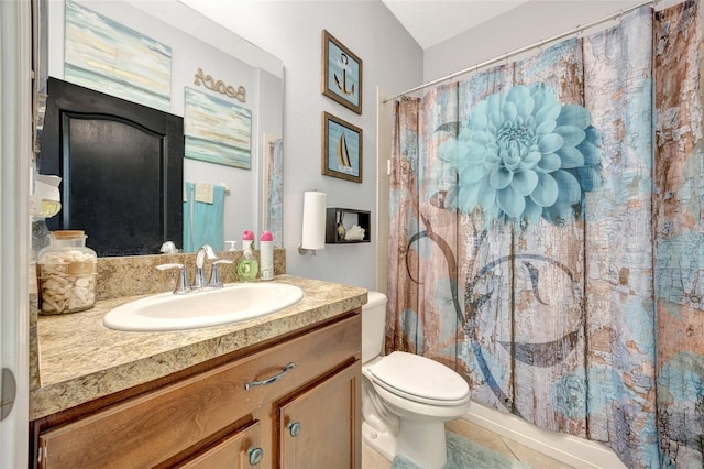 10820 Carloway Hills Dr, Wimauma, FL 33598 - bathroom featuring tile patterned flooring, curtained shower, toilet, and vanity