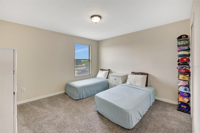 bedroom featuring light carpet