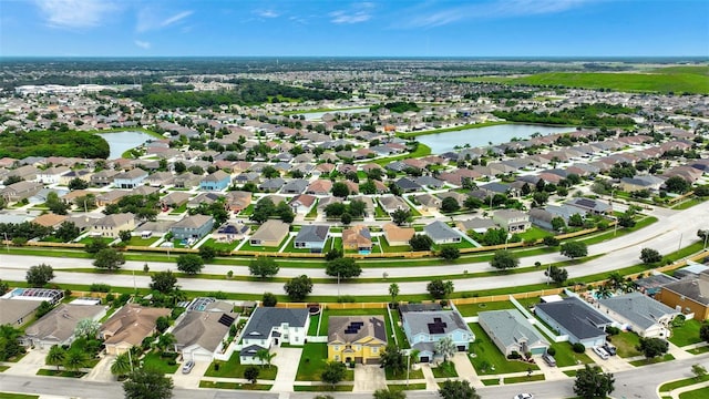 bird's eye view with a water view