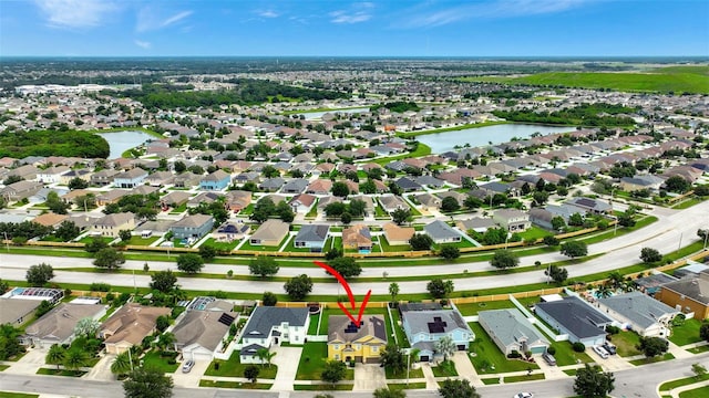 10820 Carloway Hills Dr, Wimauma, FL 33598 - drone / aerial view with a residential view and a water view