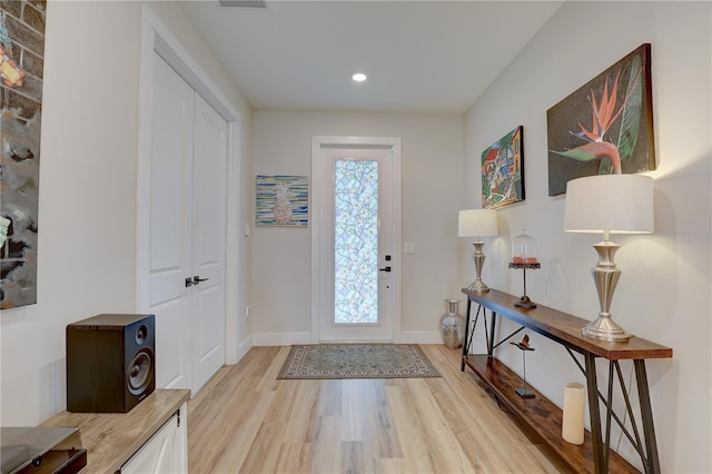 2860 14th Ave N, Saint Petersburg, FL 33713 - foyer entrance with baseboards, light wood-type flooring, and recessed lighting
