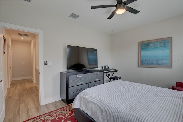 bedroom featuring light hardwood / wood-style flooring and ceiling fan