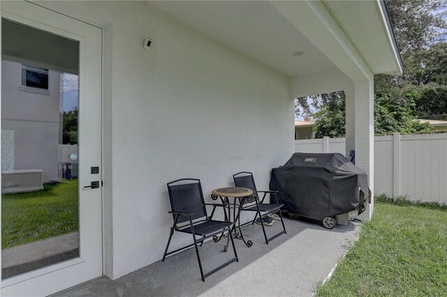 2860 14th Ave N, Saint Petersburg, FL 33713 - view of patio / terrace featuring grilling area and fence