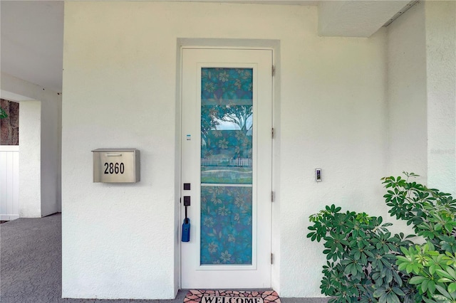 2860 14th Ave N, Saint Petersburg, FL 33713 - doorway to property with stucco siding