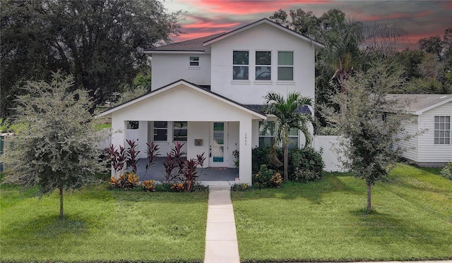 view of front of house featuring a yard