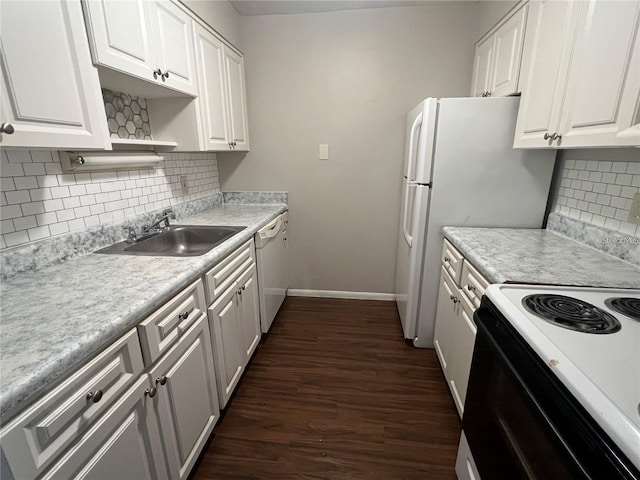 kitchen featuring white appliances, dark wood-type flooring, sink, decorative backsplash, and white cabinets