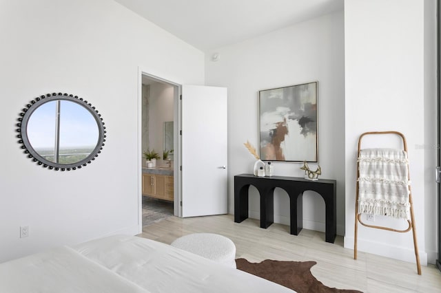 bedroom with light hardwood / wood-style flooring