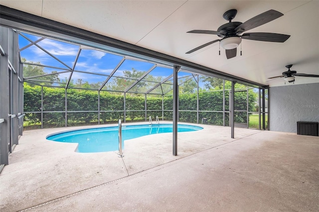 view of pool featuring ceiling fan, a lanai, and a patio area