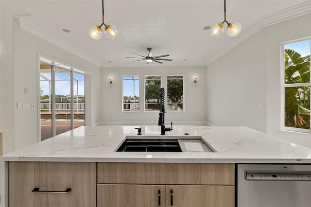 kitchen with dishwasher, sink, light stone counters, and crown molding