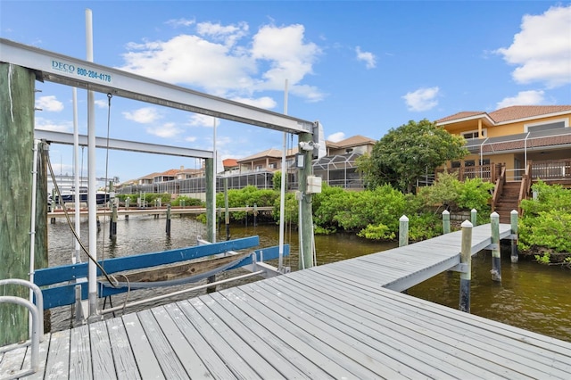 dock area with a water view