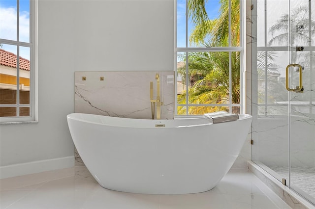 bathroom with plus walk in shower and tile walls