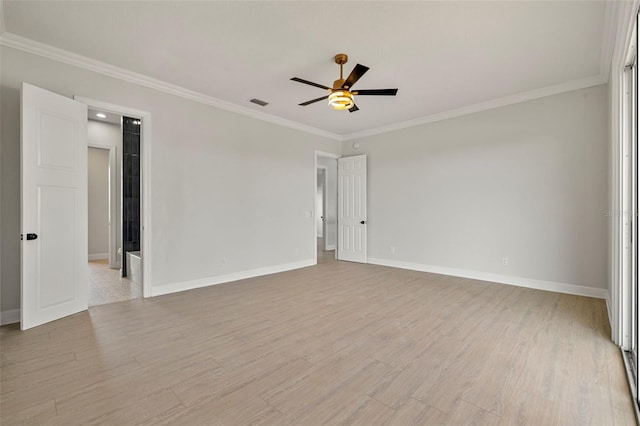 empty room featuring a ceiling fan, baseboards, light wood-type flooring, and crown molding