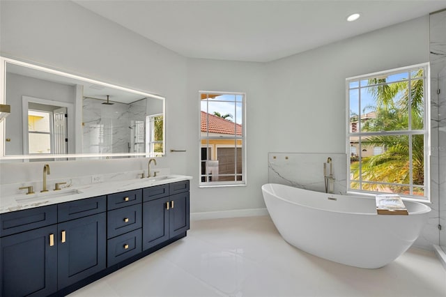 1233 Acappella Ln, Apollo Beach, FL 33572 - bathroom featuring double vanity, a soaking tub, a marble finish shower, and recessed lighting