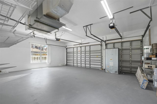 1233 Acappella Ln, Apollo Beach, FL 33572 - garage featuring a garage door opener