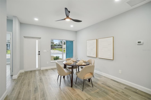 dining space with light wood-style floors, recessed lighting, baseboards, and a ceiling fan