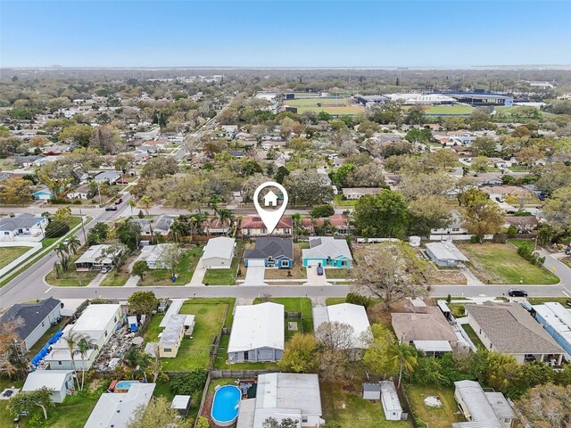 birds eye view of property with a residential view