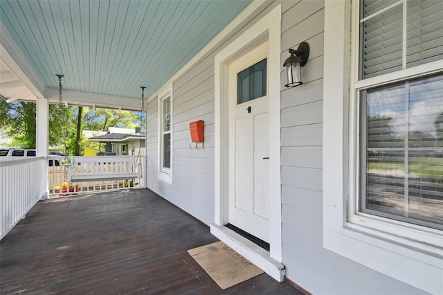 wooden deck featuring covered porch