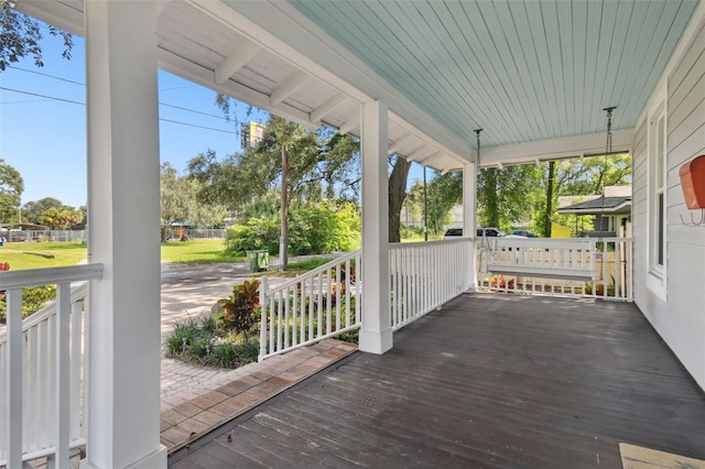 wooden deck featuring a porch