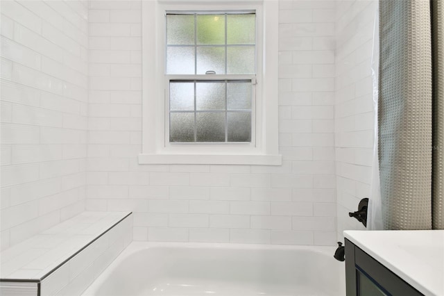 bathroom featuring shower / bath combination with curtain and vanity