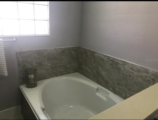 bathroom featuring a tub