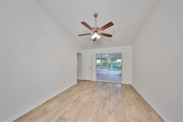 empty room featuring ceiling fan, vaulted ceiling, and light hardwood / wood-style flooring