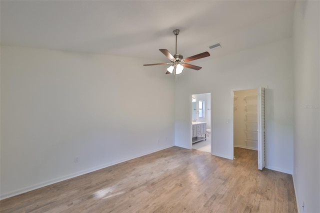 spare room with ceiling fan and light hardwood / wood-style floors