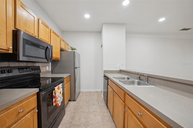 kitchen featuring black appliances, ornamental molding, light tile patterned floors, and sink