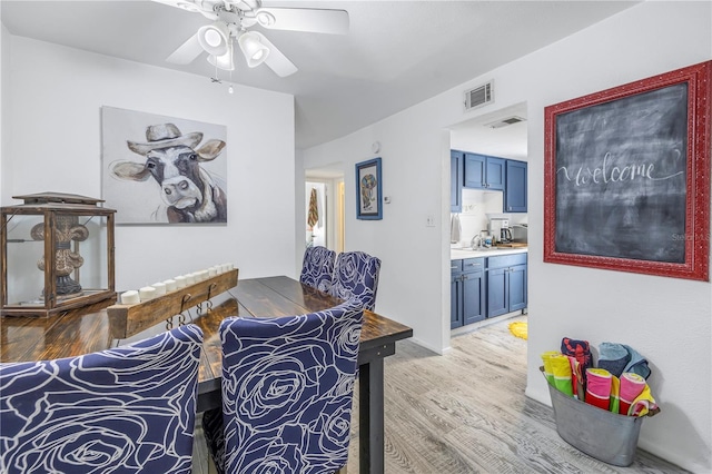 interior space featuring ceiling fan and hardwood / wood-style flooring