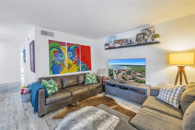 living room with hardwood / wood-style flooring