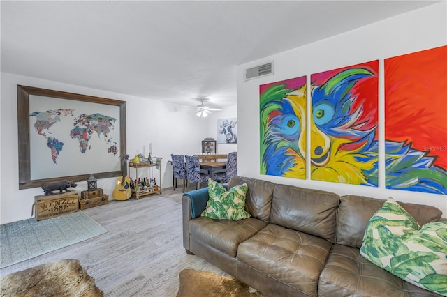 living room featuring ceiling fan