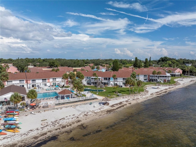 bird's eye view with a view of the beach and a water view