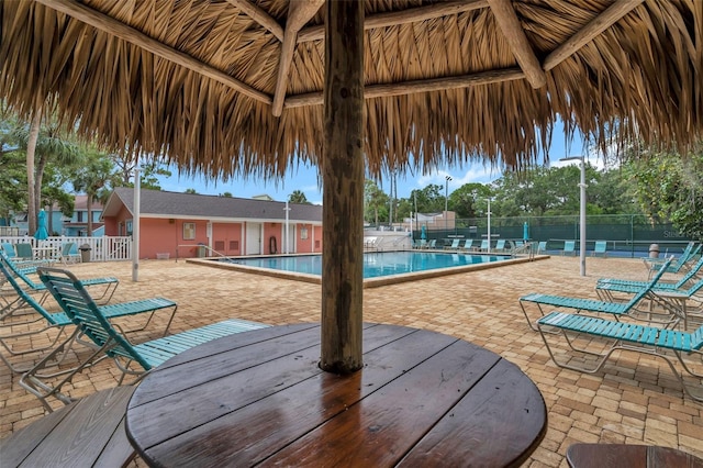 view of swimming pool with a patio