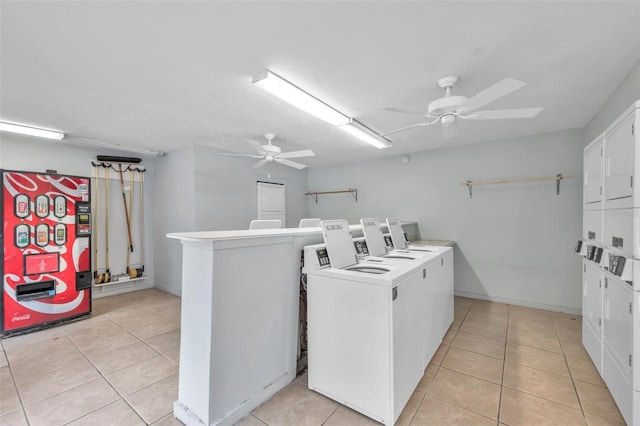 washroom featuring stacked washer / dryer, light tile patterned flooring, washer and clothes dryer, and ceiling fan