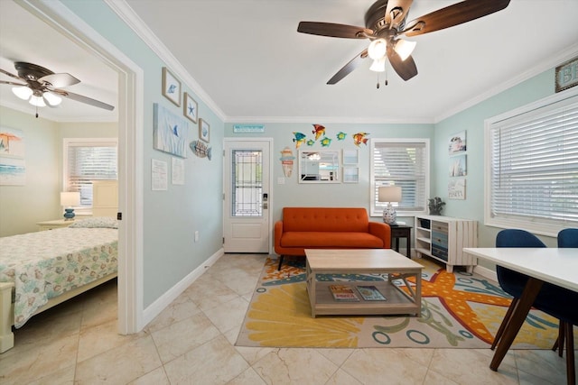 interior space with ceiling fan, ornamental molding, and a healthy amount of sunlight