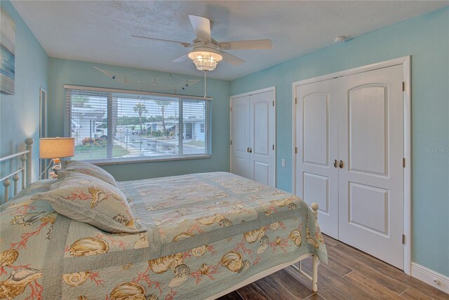 bedroom with ceiling fan and hardwood / wood-style floors